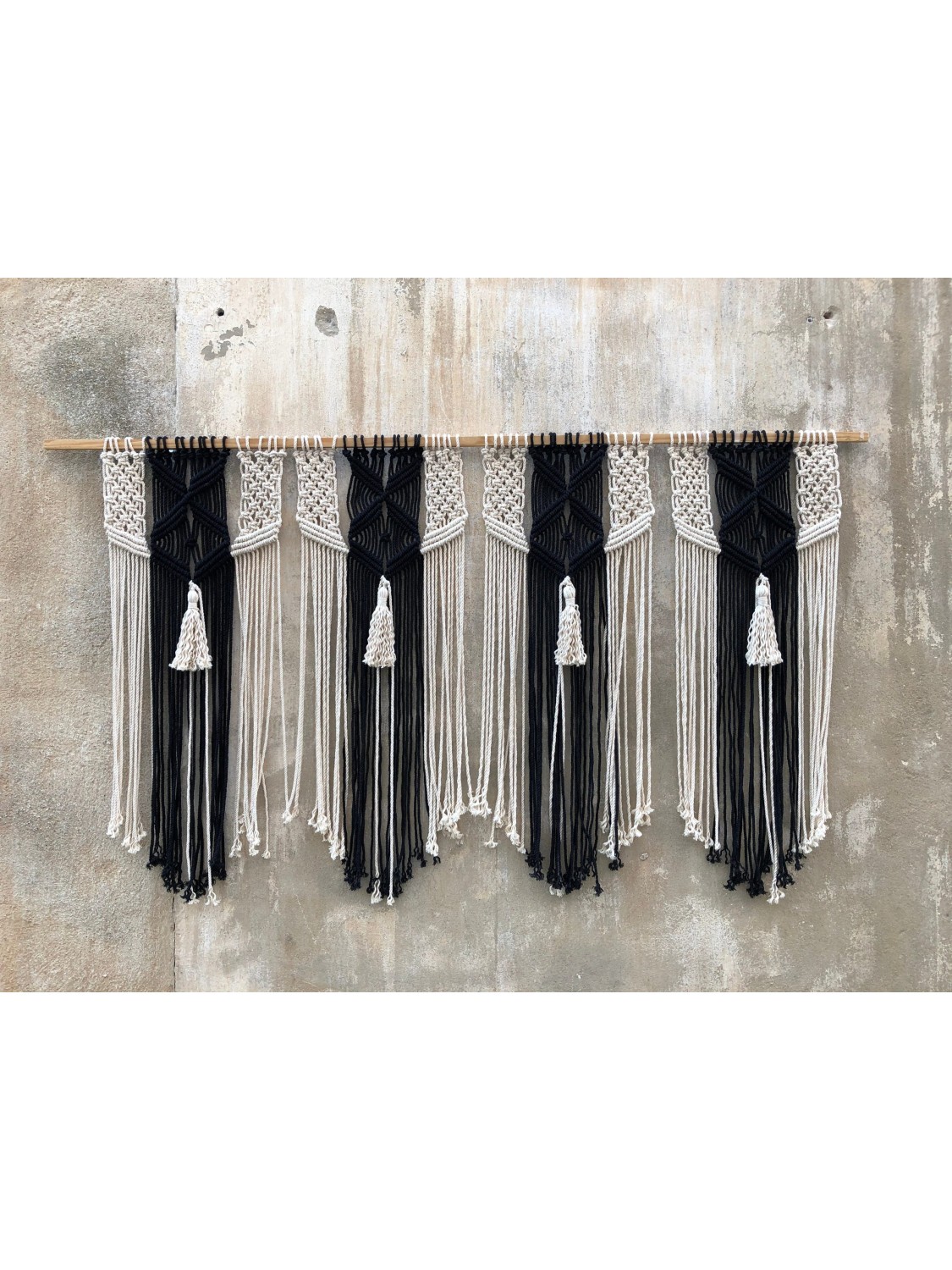 Macrame wall hanging headboard