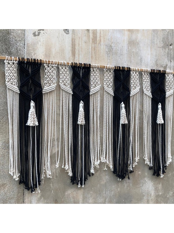 Macrame wall hanging headboard