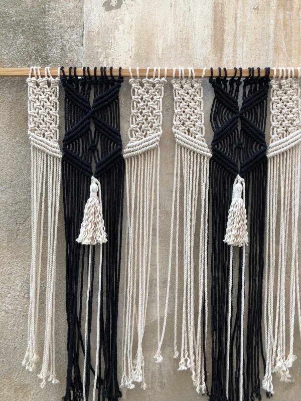 Macrame wall hanging headboard