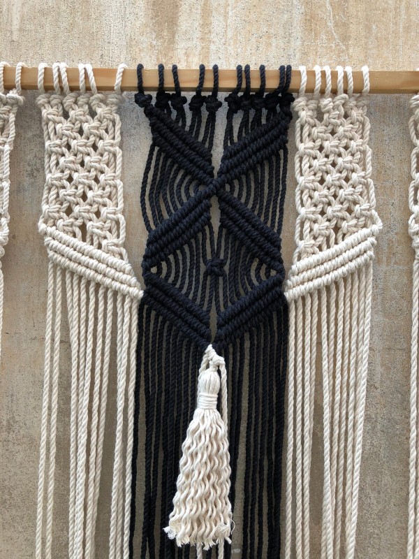 Macrame wall hanging headboard