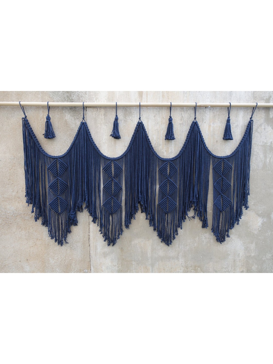 Navy blue macrame hanging headboard