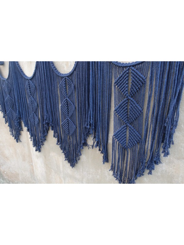 Navy blue macrame hanging headboard