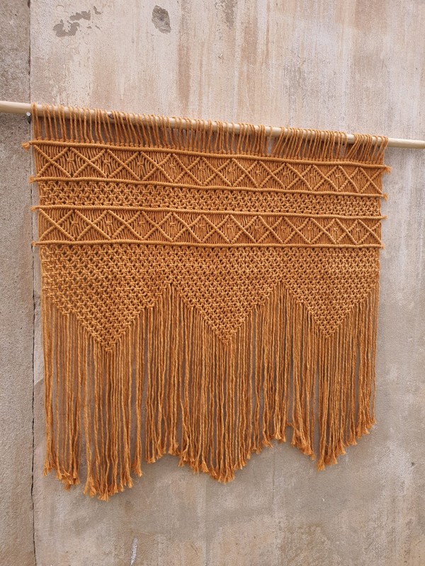 Mustard macrame wall hanging headboard