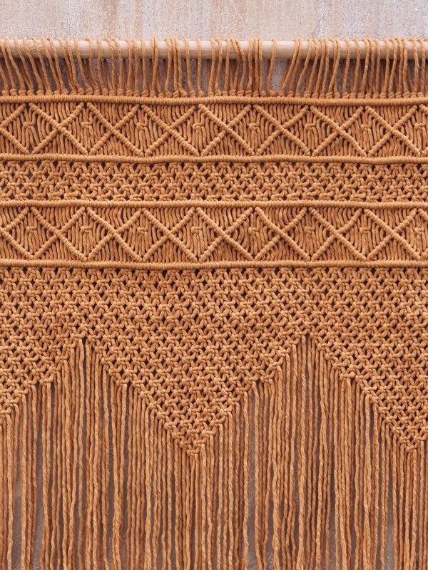 Mustard macrame wall hanging headboard