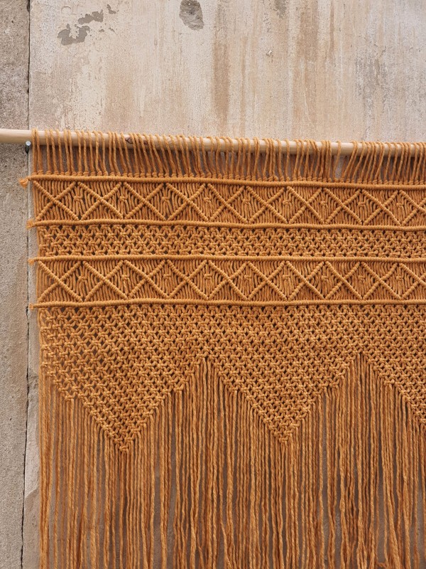 Mustard macrame wall hanging headboard