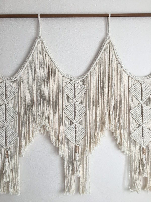 Macrame wall hanging headboard