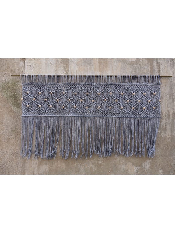 Gray macrame wall hanging headboard