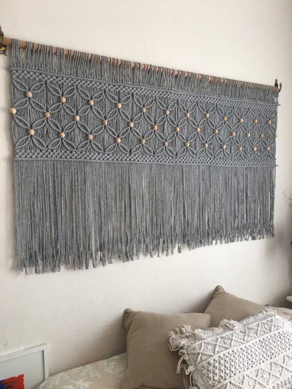 Gray macrame wall hanging headboard