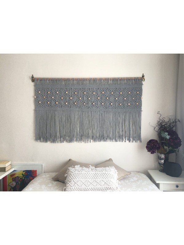 Gray macrame wall hanging headboard